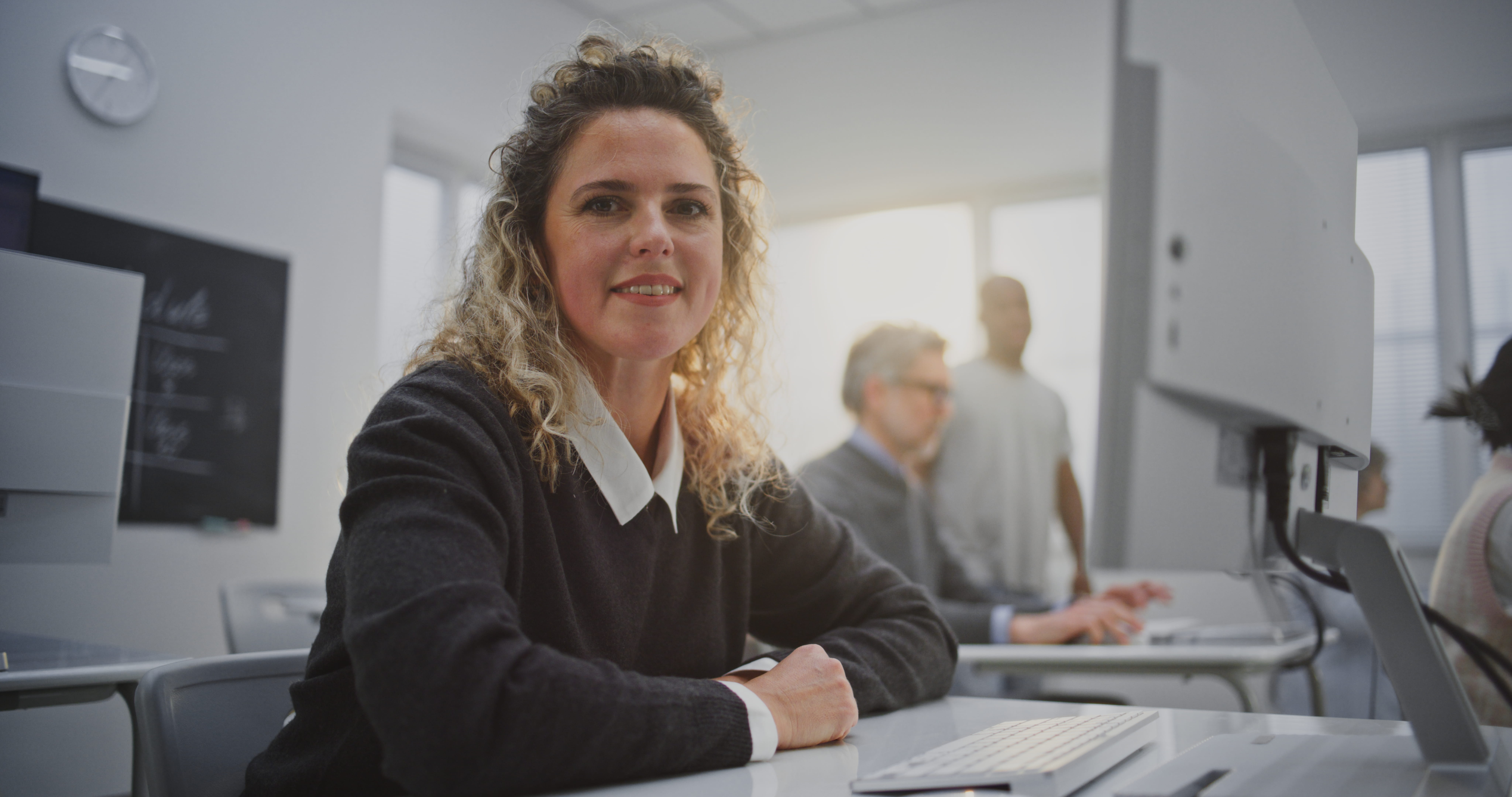 adult woman in college classroom