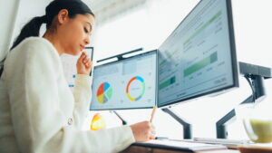 female marketer using AI on computer