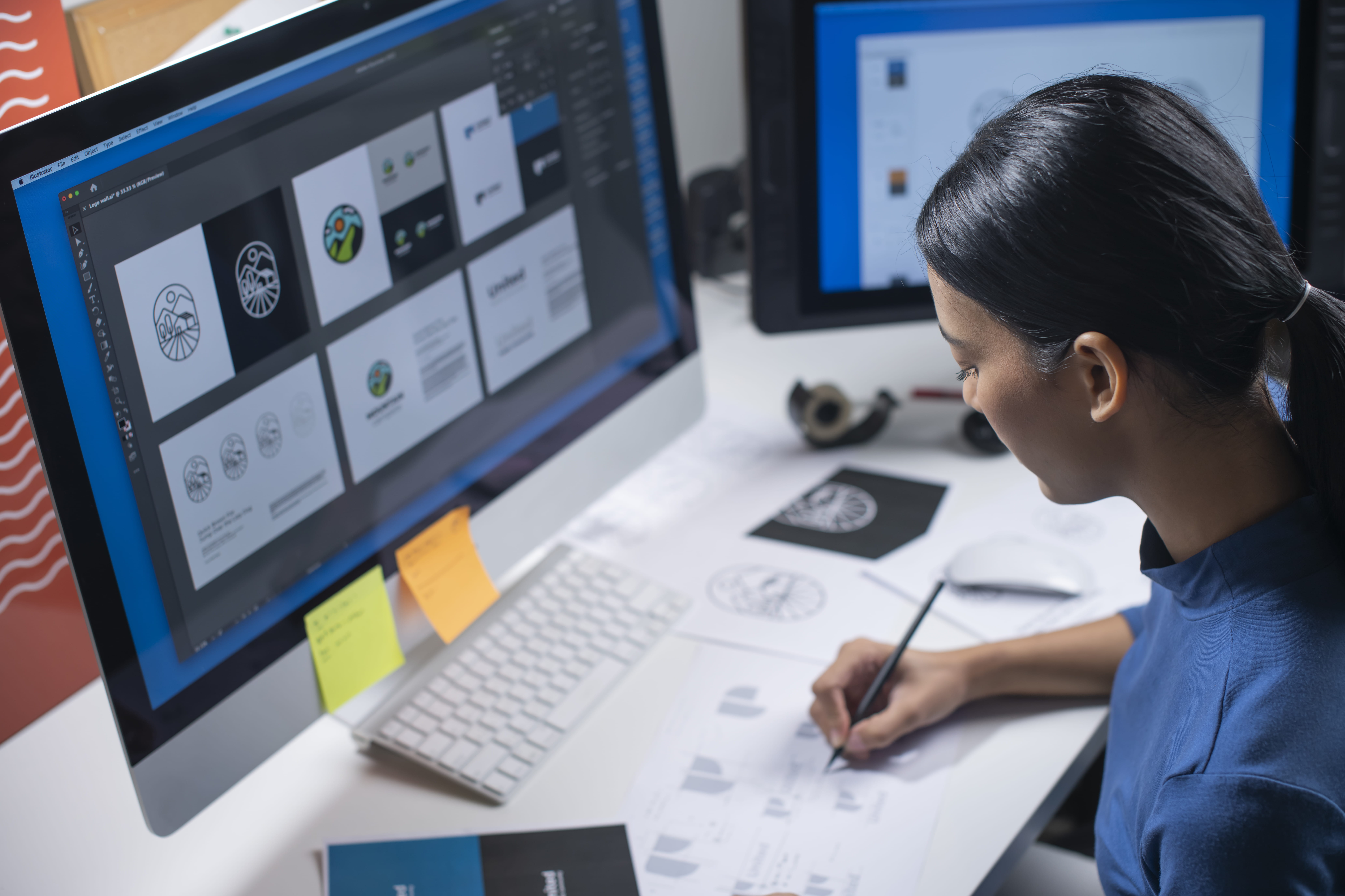 college student building a portfolio on computer